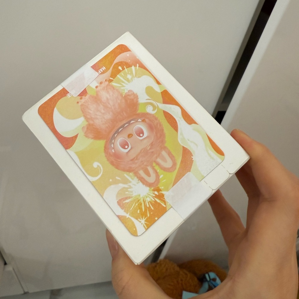 Cute Orange and White Box with Cartoon Design